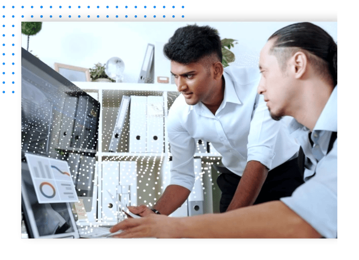 Two engineers at a desk